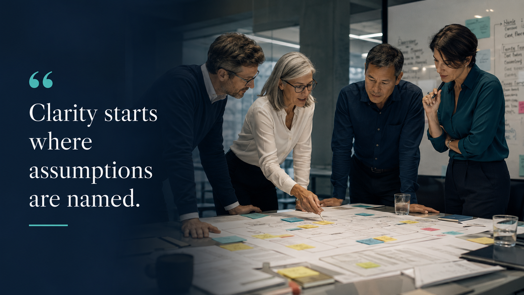 A leadership team examining assumptions and priorities together before decisions move into execution.
